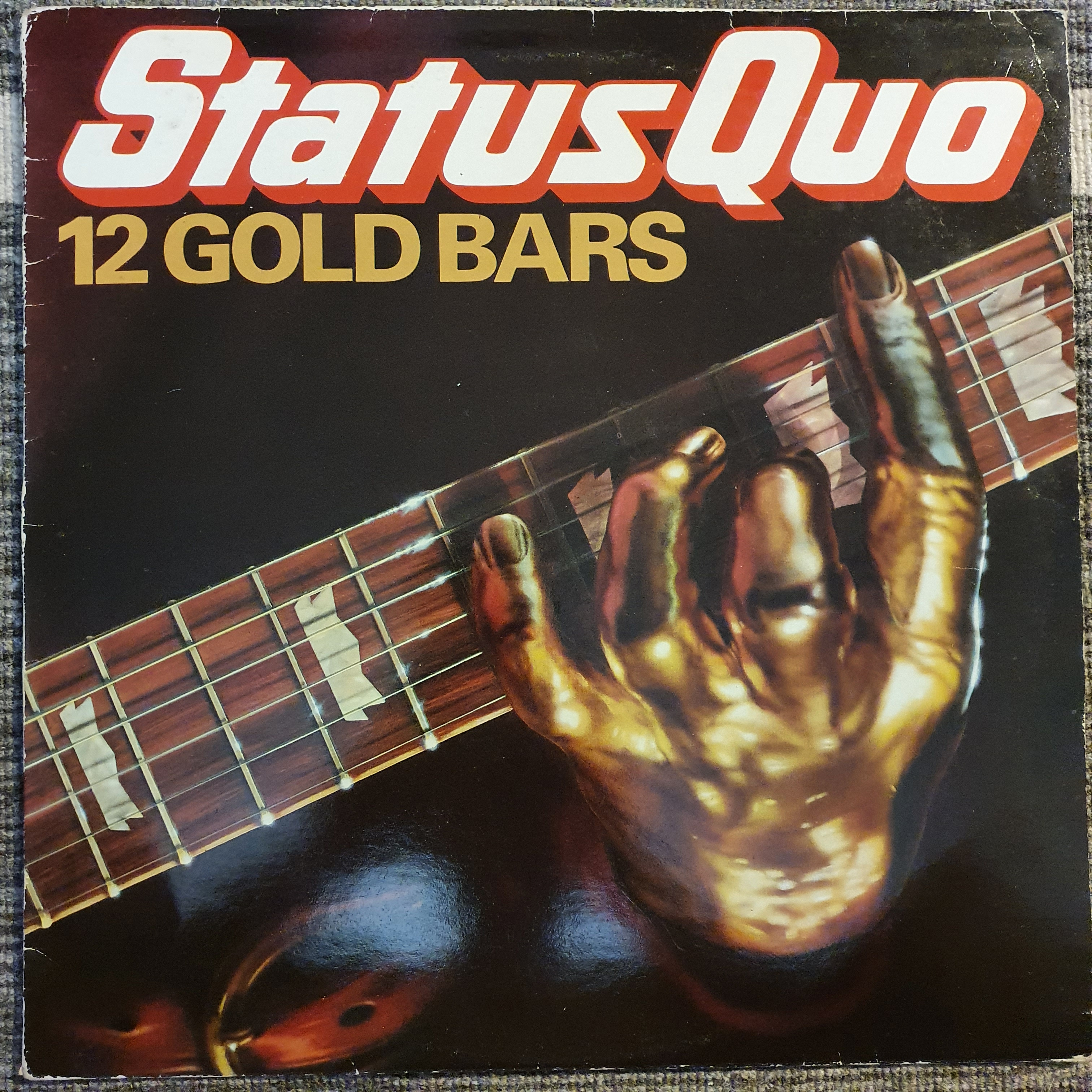 Gold 12 2. Status Quo Quo 1974. Solid Gold status Quo. Status Quo фото группы. Status Quo Rockin' all over the World.